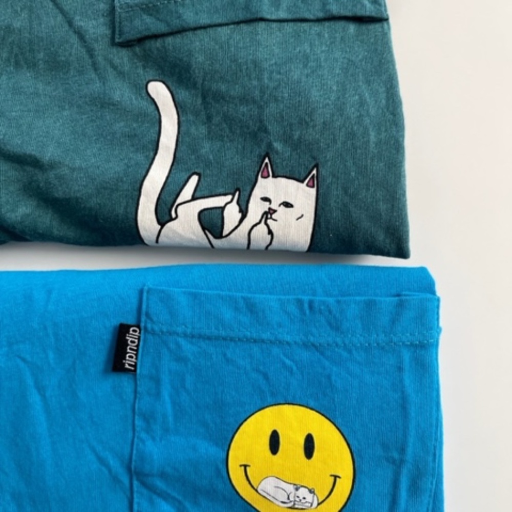 TWO Rip N Dip short sleeve t- shirts in green and blue with Lord Nermal kittys.
